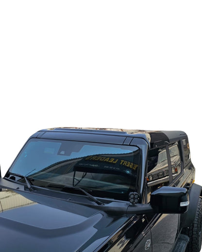 Black SUV with a clear windshield on a white background